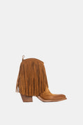 Brown suede boot with fringes on a white background